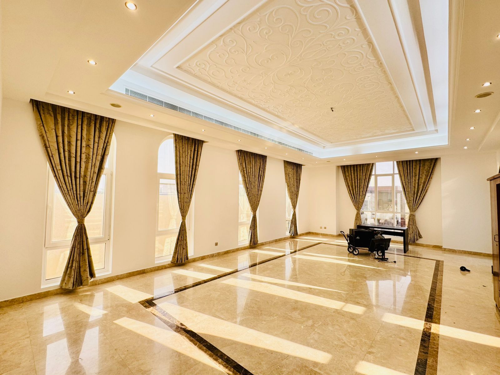 Terracotta dress curtains integrated over delicate sheer voile underlays